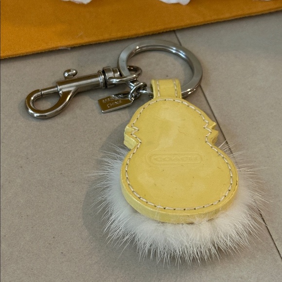 Coach Yellow and White Pom Pom Keychain - Picture 4 of 7